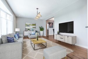Through Virtual Staging, we were able to give Buyers a sense of what a more traditional living room layout would look like.